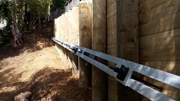 back Timber Pole Retaing Wall With Steel Waler And Anchors